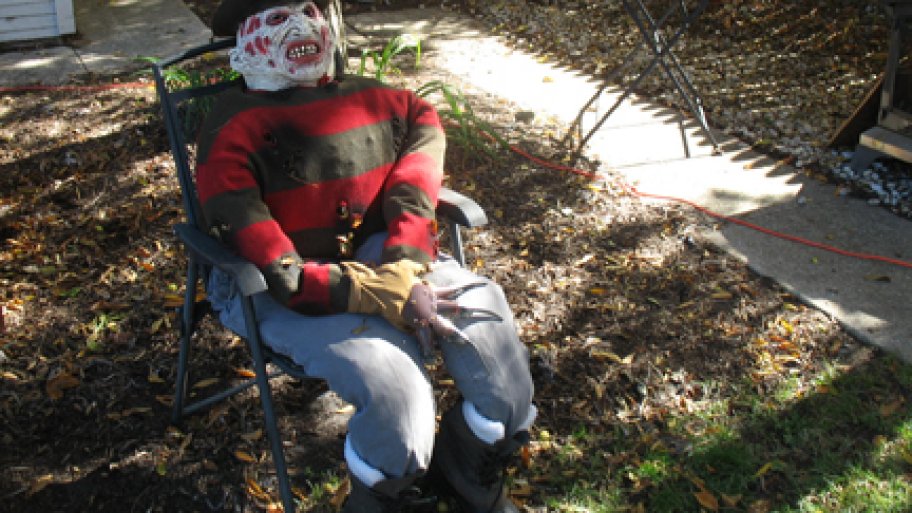 i made this freddy krueger dummy by stuffing last years halloween costume with leaves it didnt cost a penny and it makes me flinch every time i walk