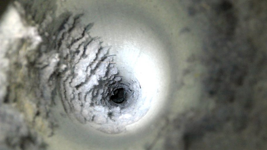 Dryer vent cleanings can remove lint buildup in the vent (pictured) to improve its efficiency and protect your family from potentially dangerous fires. (Photo courtesy of Adam W.)