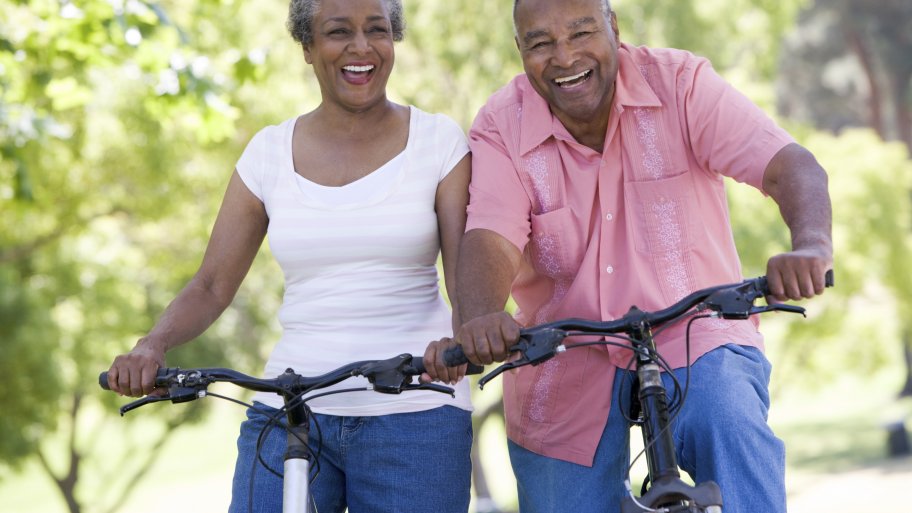 senior couple riding bikes